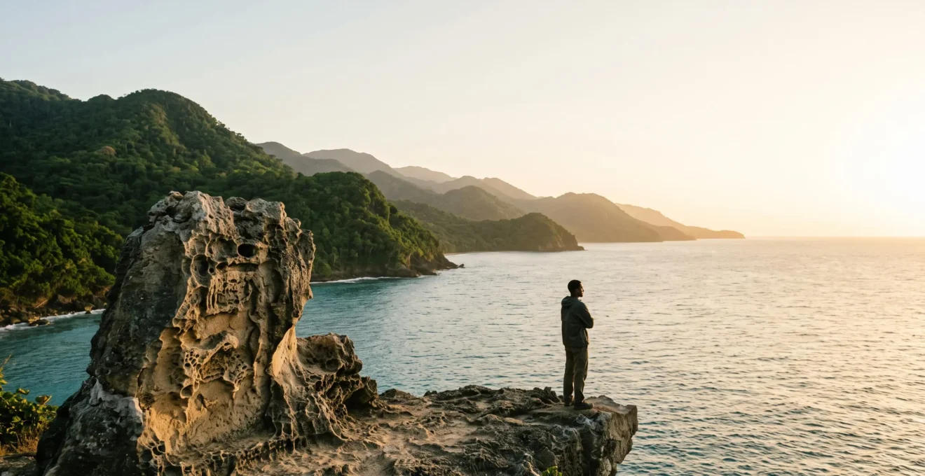 Dramatic wide view of a Dominican coastal landscape at golden hour symbolizing the ancestral Taino identity of Quisqueya