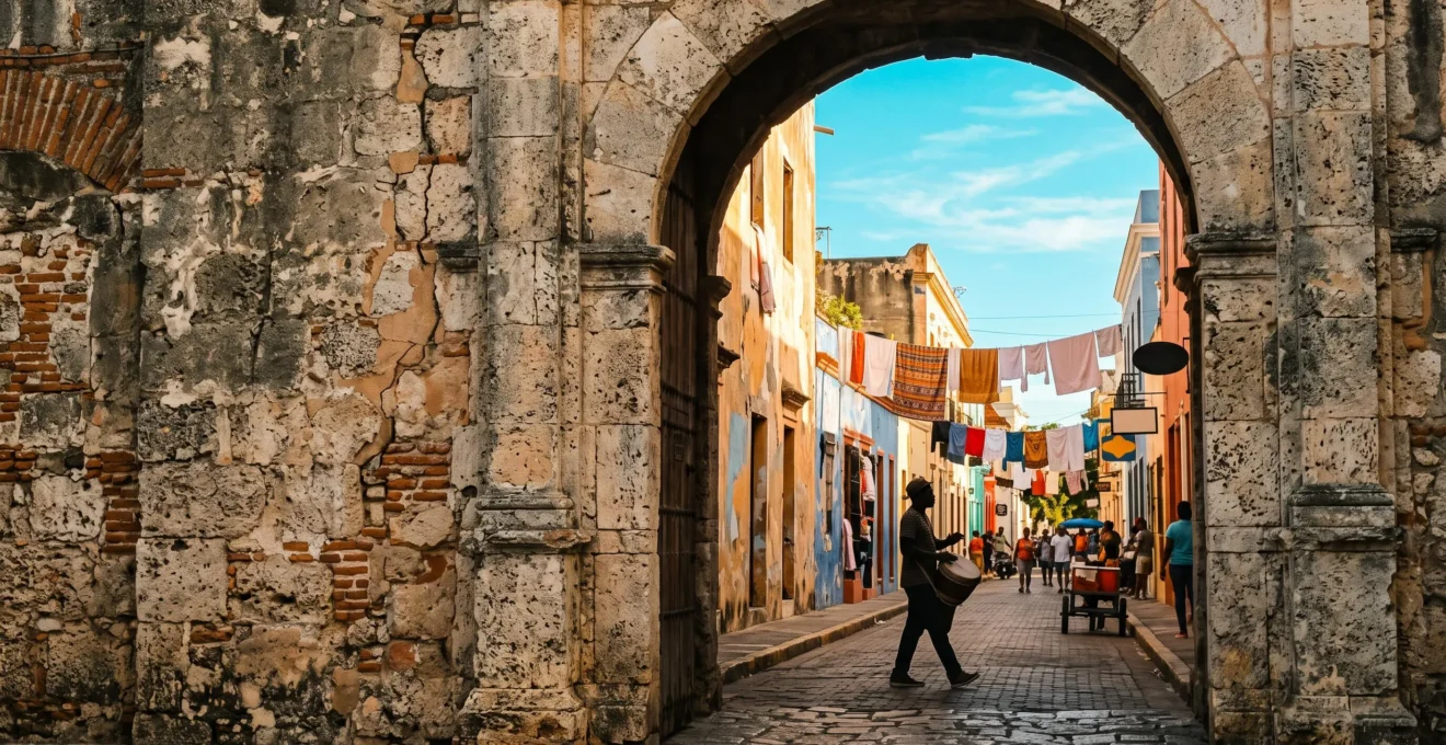 Editorial wide shot symbolically blending Spanish colonial stone architecture with Caribbean tropical life in the Dominican Republic